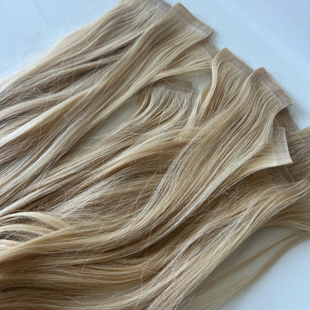 Hair Talk, tape in hair extensions. 17 inches and a pack of 20 total extensions.